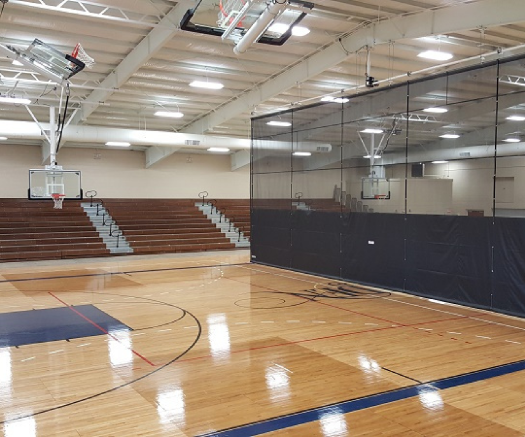 Custom dark blue gymnasium curtain netting dividing the court 