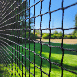 Golf Netting with green grass and trees